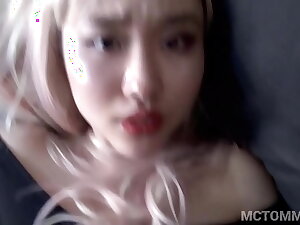 Beautiful Asian 18yo teen fucks in a pink wig and in a leotard and gets a big facial